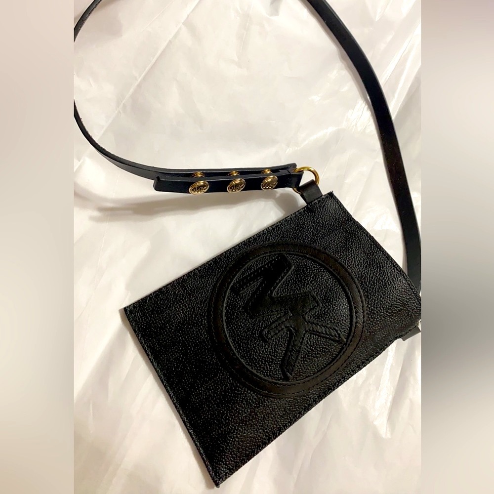 NWOT Michael Kors Small belt bag. The length is 4.5” height is 6.5”